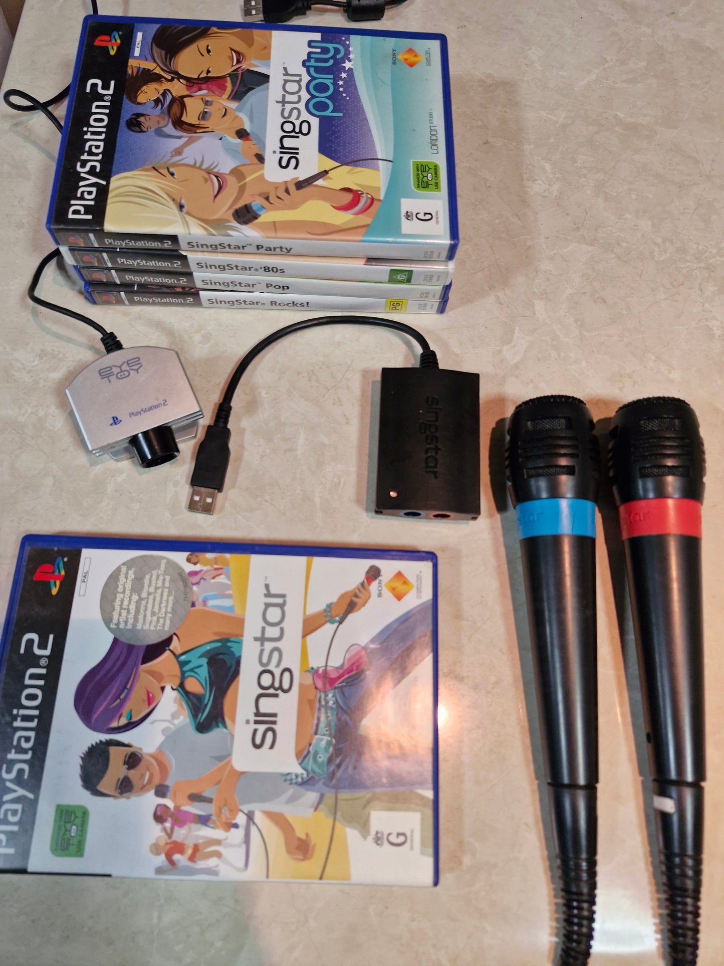 SingStar Bundle (PlayStation 2, PAL) – 5 Games + 2 Microphones + USB Adapter + EyeToy Camera – Sony Computer Entertainment