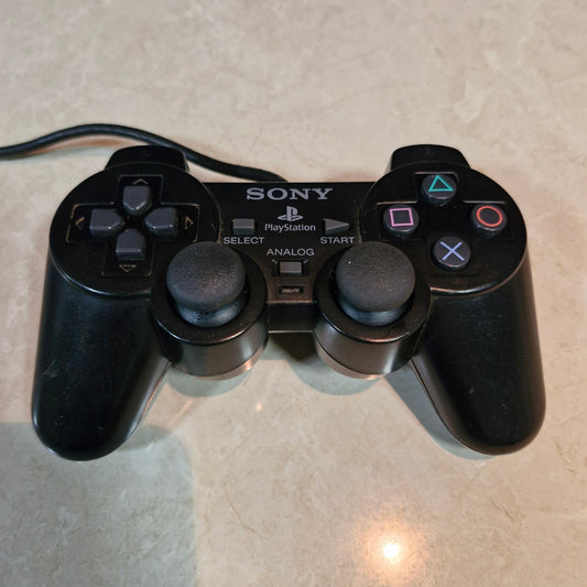 Sony PlayStation DualShock Wired Controller – Black (PS1/PS2 Compatible, Original)