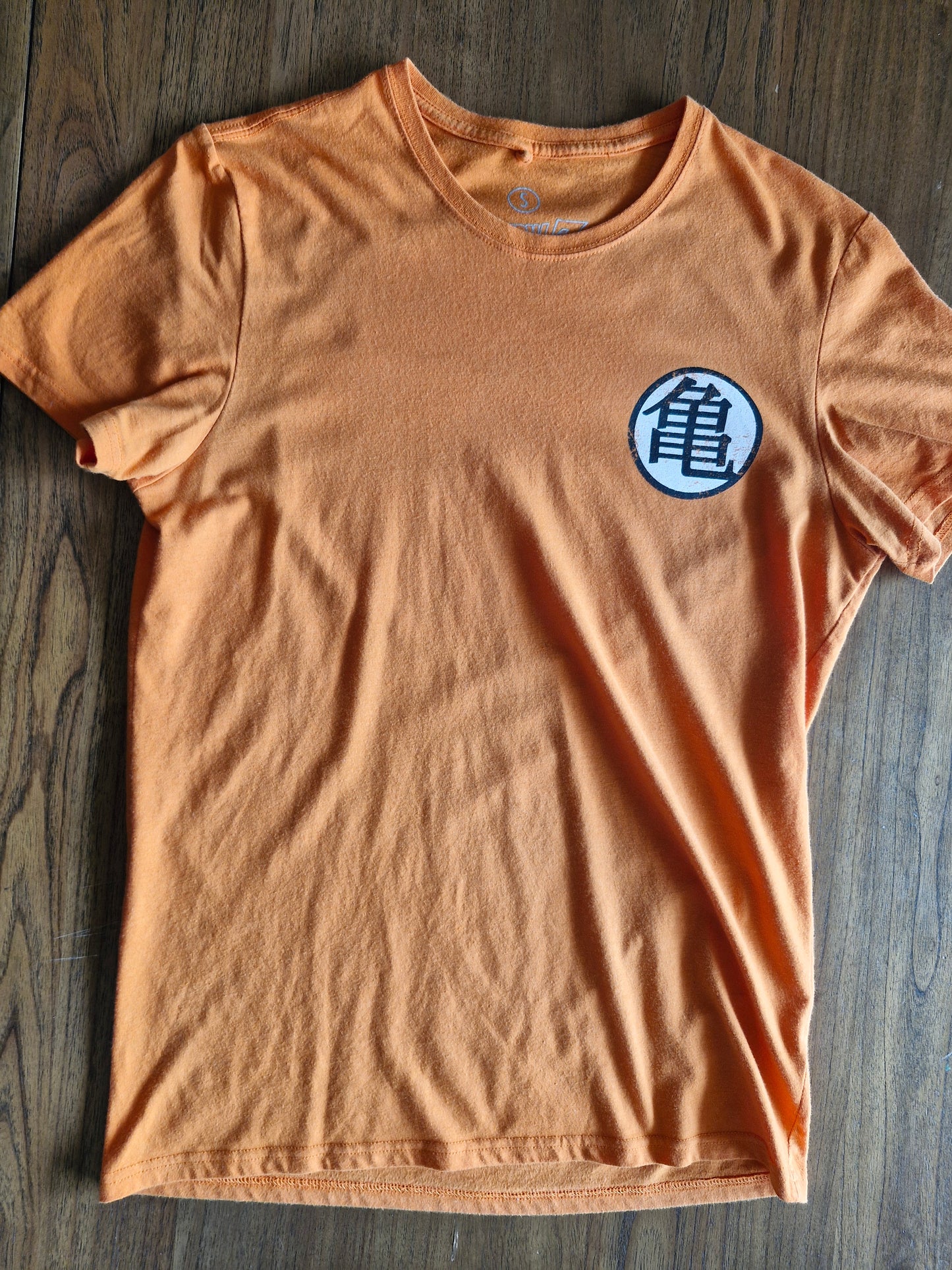 Dragon Ball Z “Kame” Goku Training Symbol T-Shirt – Orange (Size Small)