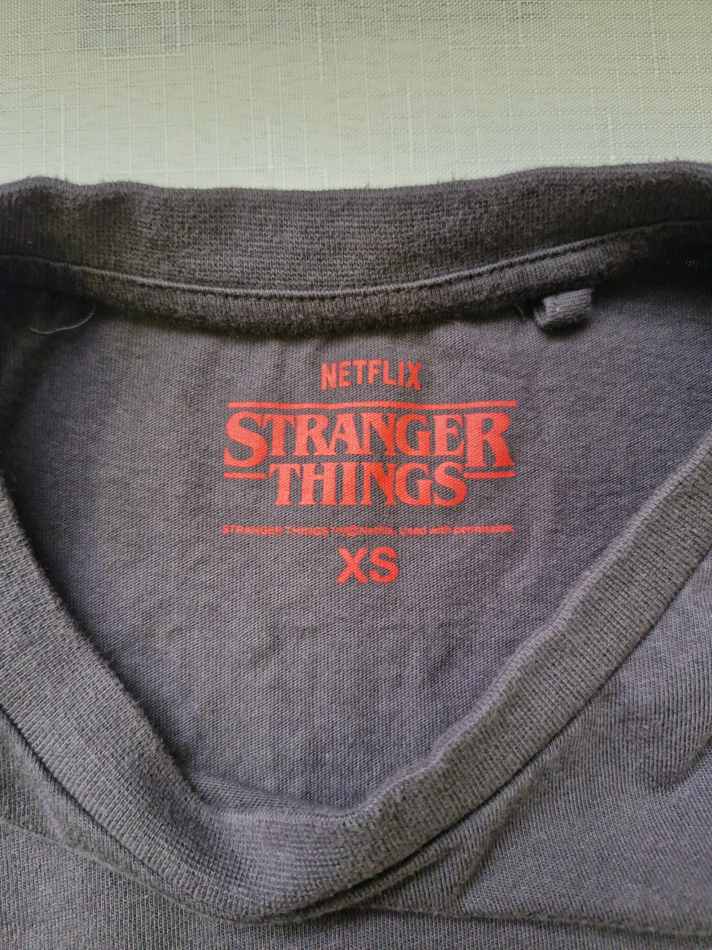 Stranger Things Eleven Double-Sided Graphic T-Shirt - Faded Black - Size Men's XS